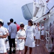 Grace Tucker, nurse, and unknown others arriving in Tunisia on SS HOPE